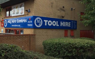 Tool Hires Pan sign fascia extends round a corner of the building.