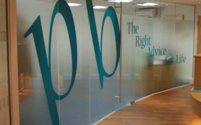 A Frosted window vinyl used to divide an office from a meeting room.