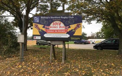 Large Board used to advertise a fireworks display on wooden boards