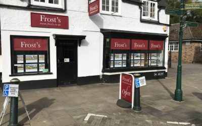 Custom Estate Agent Fascia with bespoke blinds featuring logos and a pavement sign.