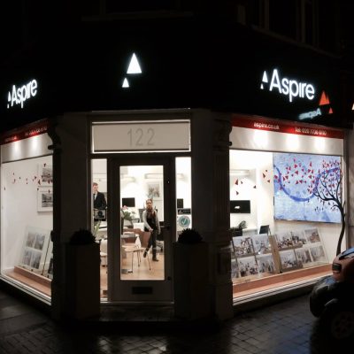 Aspire illuminated shop front with window cling and illuminated interior map
