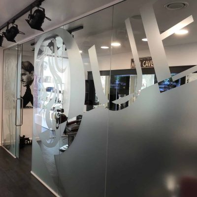 a frosted window graphic for a salon
