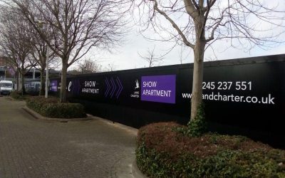 A completed Construction Site Hoarding featuring graphics and information.