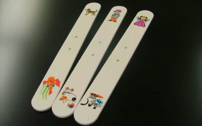 Eye test sticks with cartoons on them